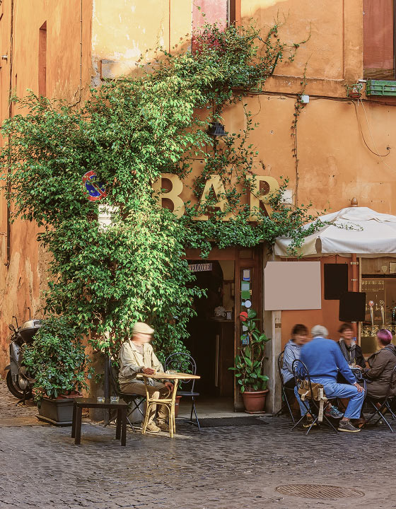 Charming Italian trattoria entrance with ivy and warm lighting