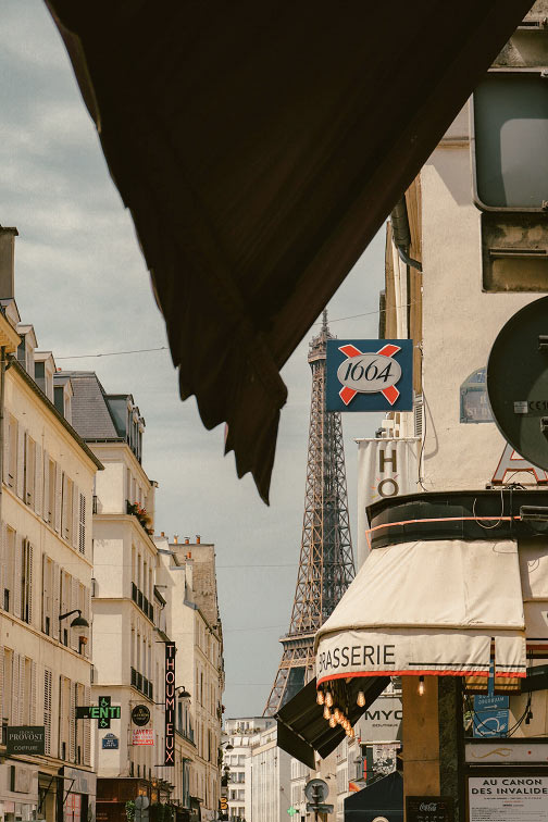 Street view with the Eiffel Tower in Paris